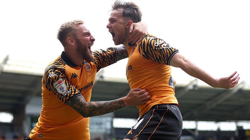 Oli McBurnie, left, and Joe Gelhardt, right, celebrate after Gelhardt scores for Hull City