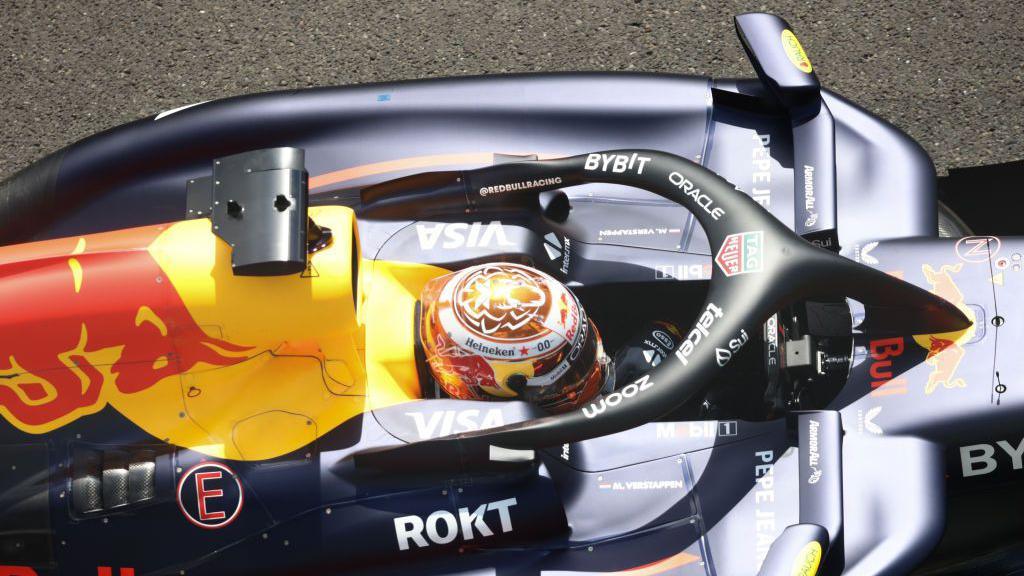 Image of Max Verstappen's 2024 Red Bull car, which includes the halo in his cockpit