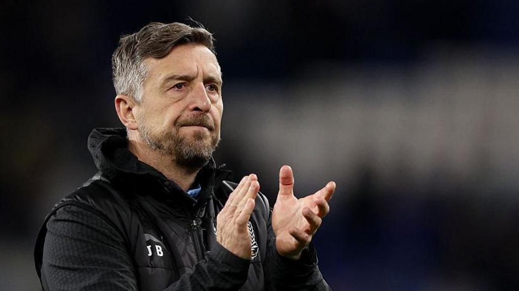 Port Vale boss Jon Brady clapping his hands