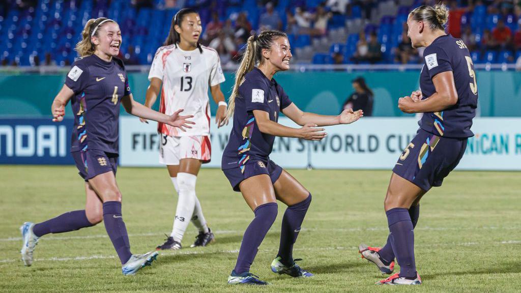 England Women's U17s celebrate victory over Japan