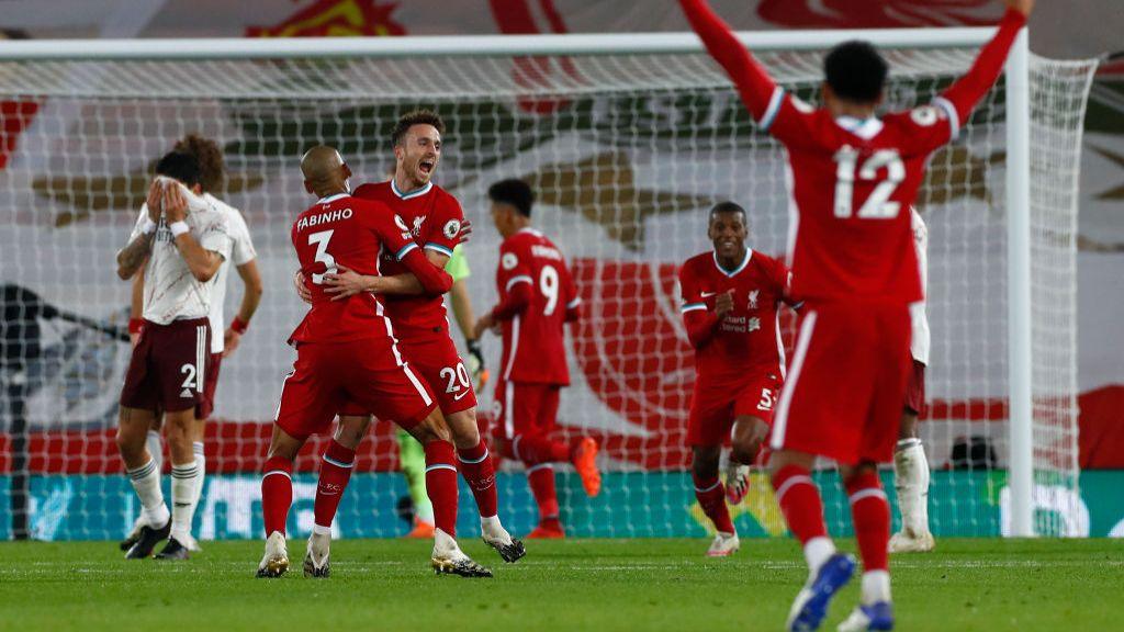 Jota celebrates with Liverpool team-mates after scoring against Arsenal on his Premier League debut for the club in September 2020