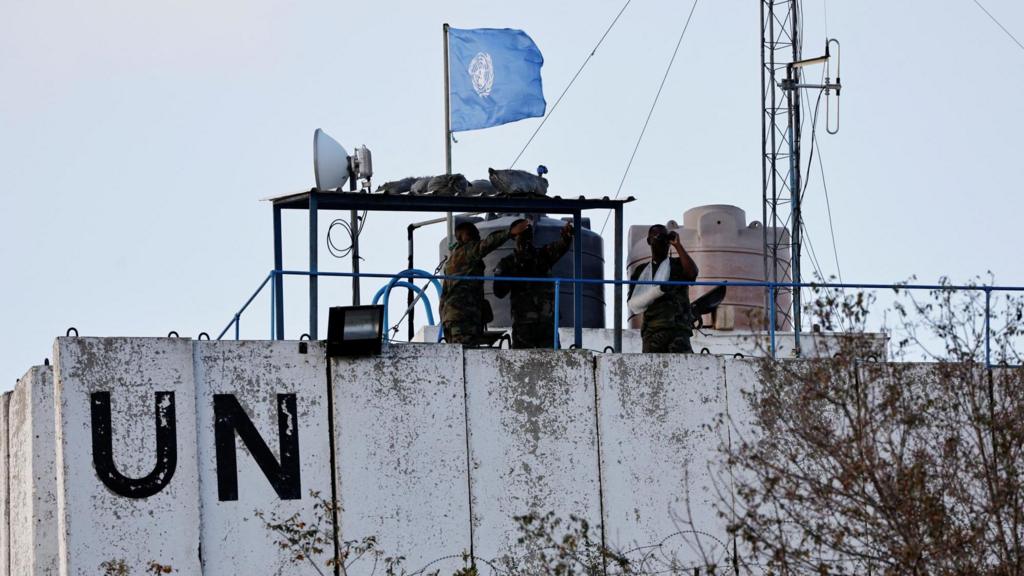 United Nations peacekeepers (UNIFIL) look at the Lebanese-Israeli border