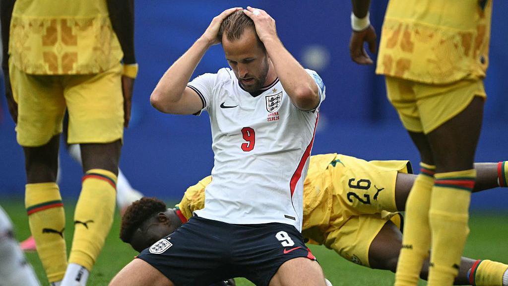 England's forward #09 Harry Kane reacts after missing a goal opportunity during the 2026 World Cup Group L football match between England and Ghana at the Boston Stadium in Foxborough on June 23, 2026. (Photo by MAURO PIMENTEL / AFP via Getty Images)