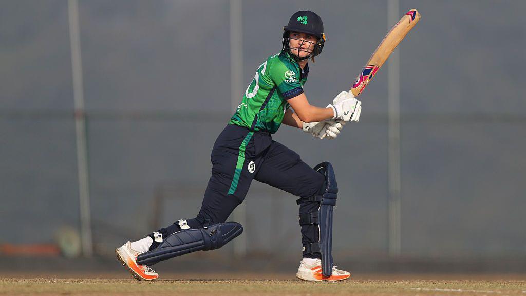 Gaby Lewis runs between the wickets