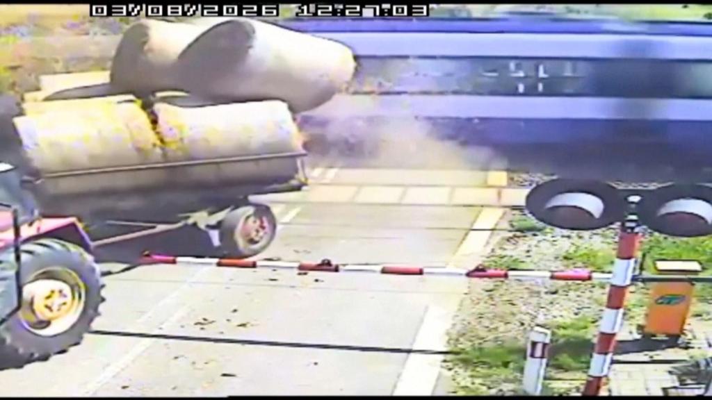 Watch: Moment passenger train crashes into trailer carrying straw bales
