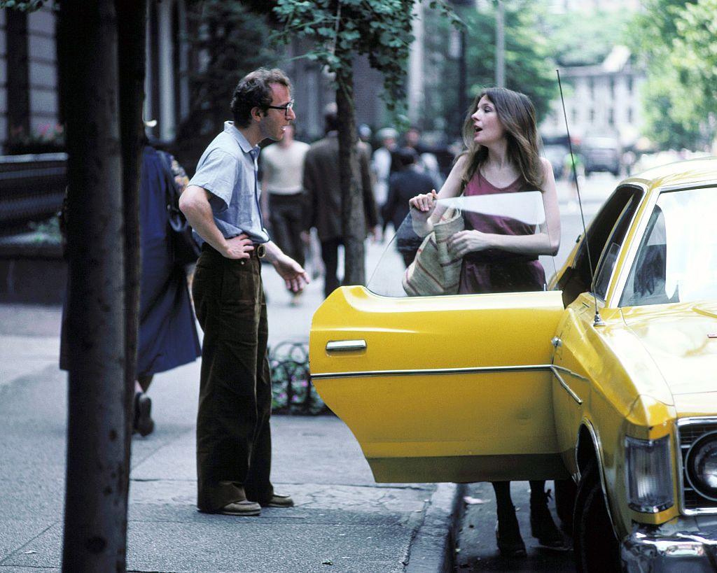 Woody Allen talking to Diane Keaton as she gets into a tax on a New York City street in the film Annie Hall