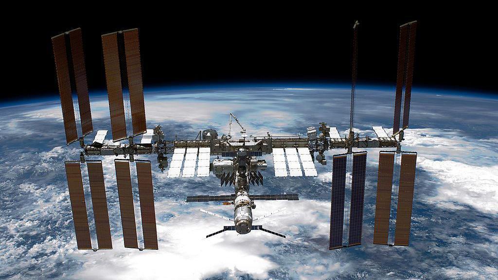 The international space station floating over Earth