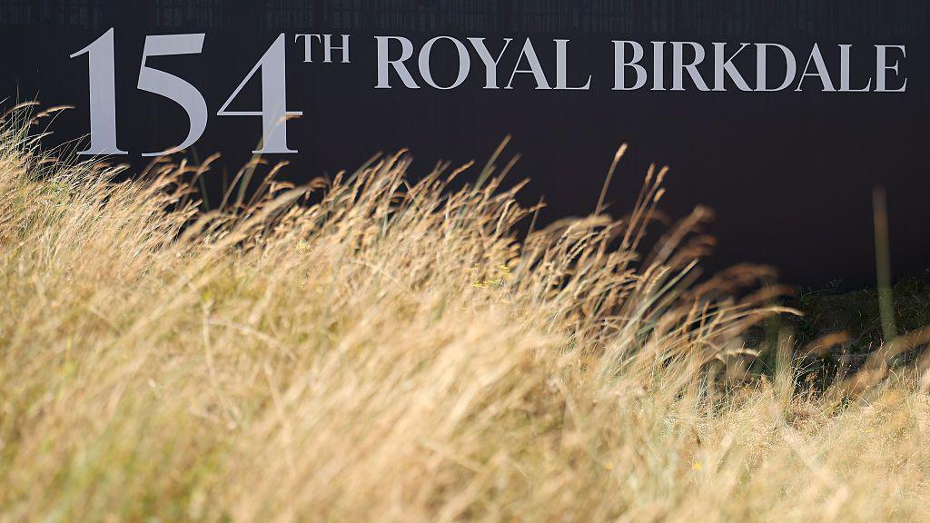 A sign of the 154th Open Championship adorns a stand at Royal Birkdale.