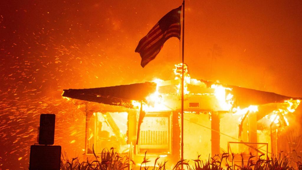 House burning with flag