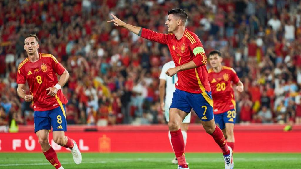 Alvaro Morata celebrates