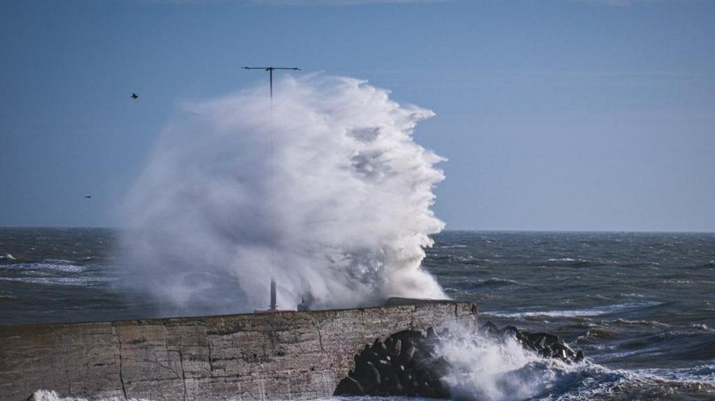 Waves crashing high over the breakers at Killkeel