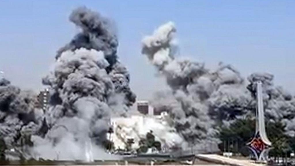Smoke rises from the Syrian army's General Staff Complex after Israeli warplanes carried out multiple airstrikes in Damascus, Syria