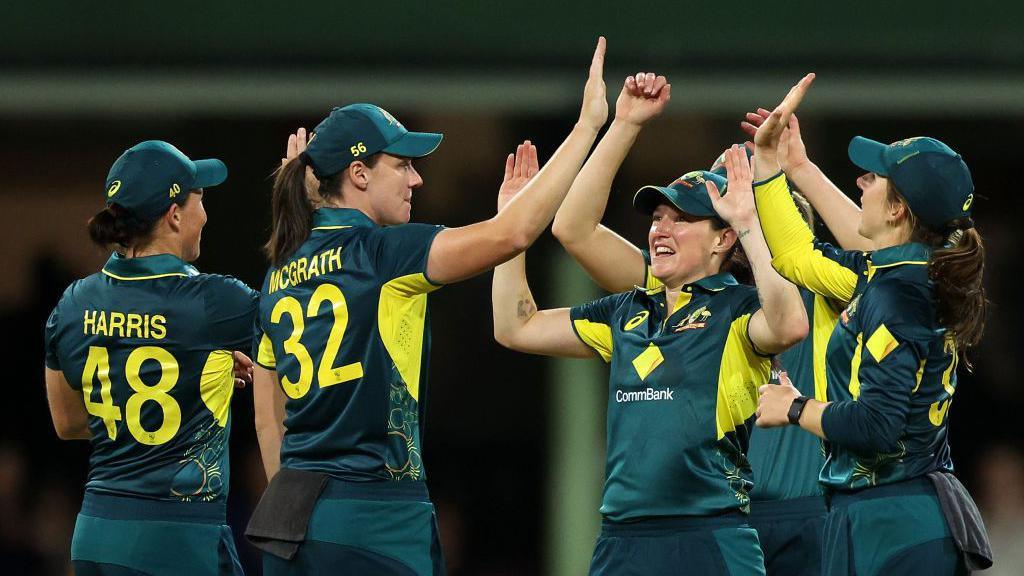 Australia players celebrating after beating England.