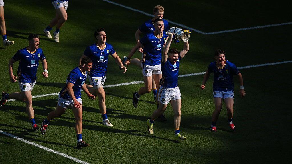 Wicklow players celebrate with Tailteann Cup