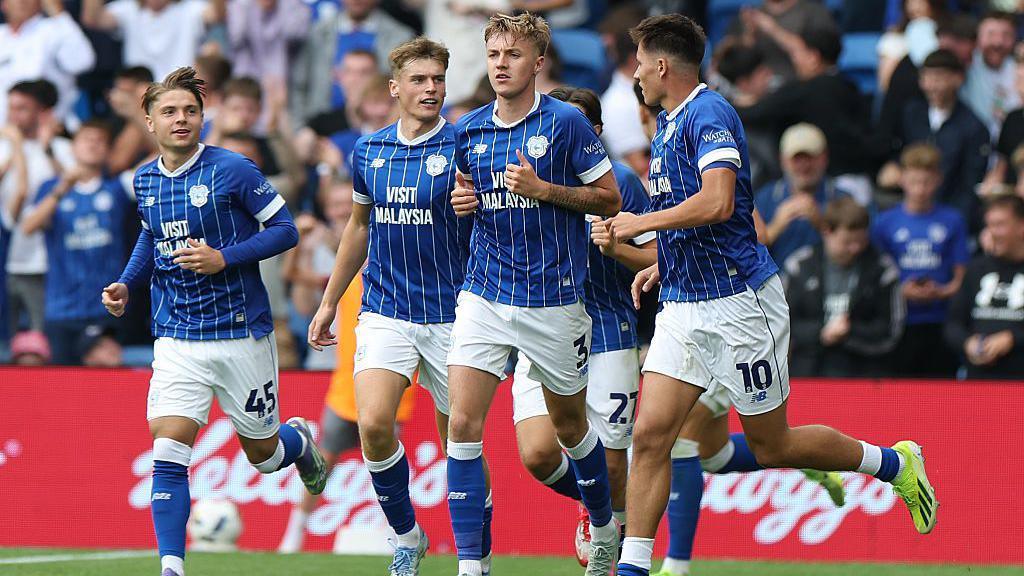 Cian Ashford, Dylan Lawlor, Joel Bagan, Joel Colwill and Rubin Colwill run after celebrating Rubin Colwill's goal for Cardiff City.