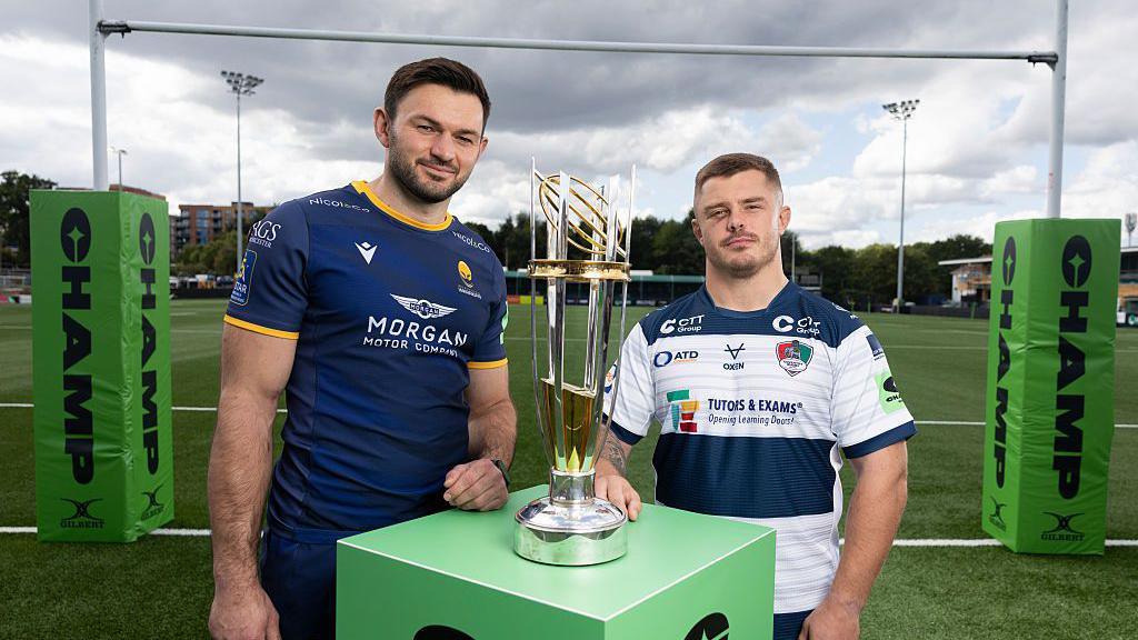 Worcester Warriors captain Matt Rogerson and Coventry's Jordan Poole pose with the Champ trophy