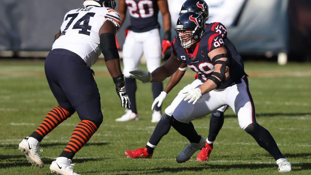 JJ Watt (right) playing for the Houston Texans, facing up to Chicago Bears defensive guard Germain Ifedi