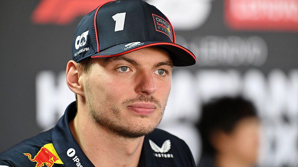 Max Verstappen talks to the press in the paddock in Hungary 