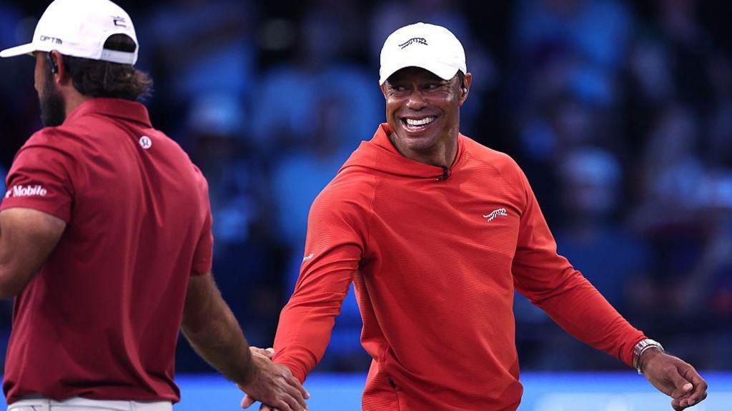 Tiger Woods celebrates