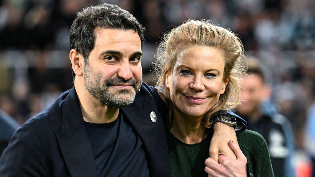 Amanda Staveley (right) and husband Mehrdad Ghodoussi (left) on the pitch at St James' Park