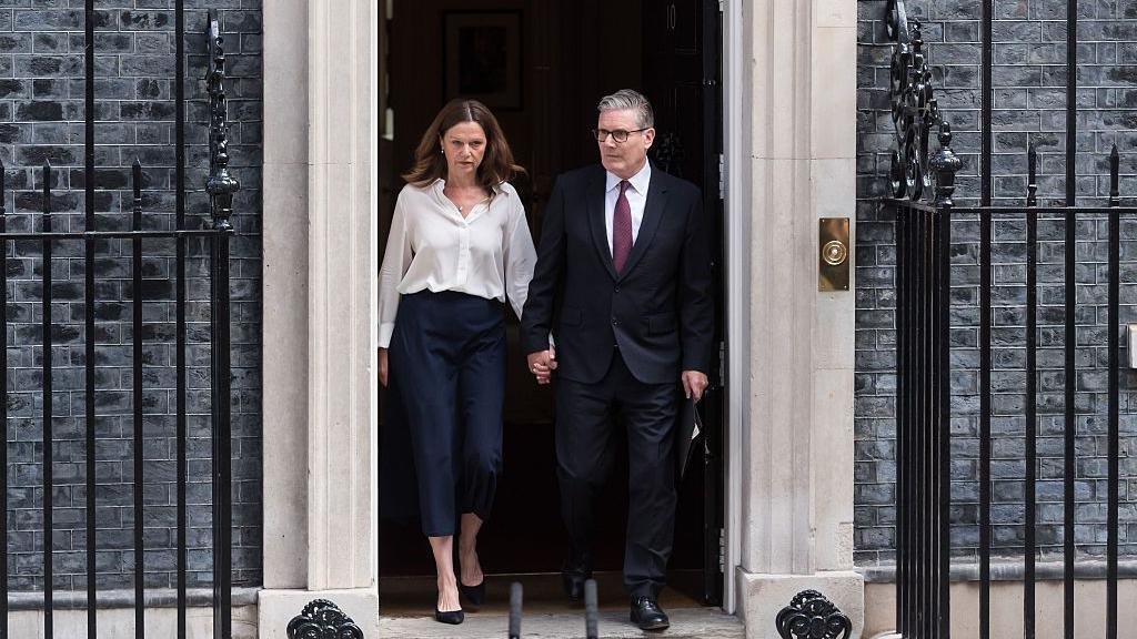 Sir Keir Starmer and his wife Victoria Starmer step out from 10 Downing Street ahead of Mr Starmer's speech.