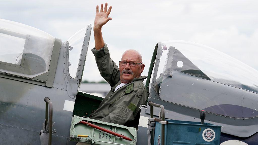 Chelsea Pensioner Mike Smith on a surprise flight in a Spitfire