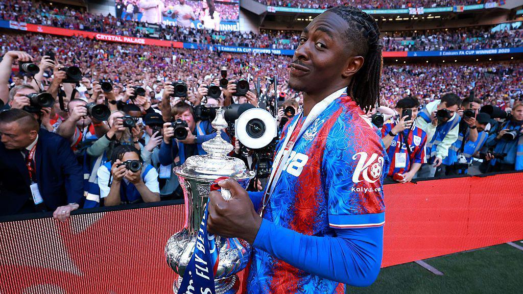 Eberechi Eze celebrates with FA Cup