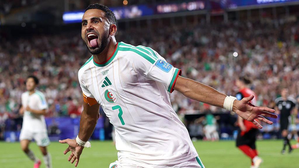 Riyad Mahrez celebrates his equaliser against Austria