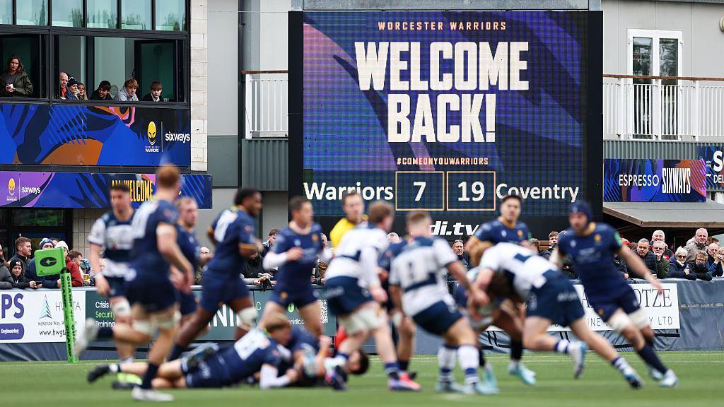 General view of the Worcester verses Coventry match with the digital scoreboard in the background showing the score and WELCOME BACK above it