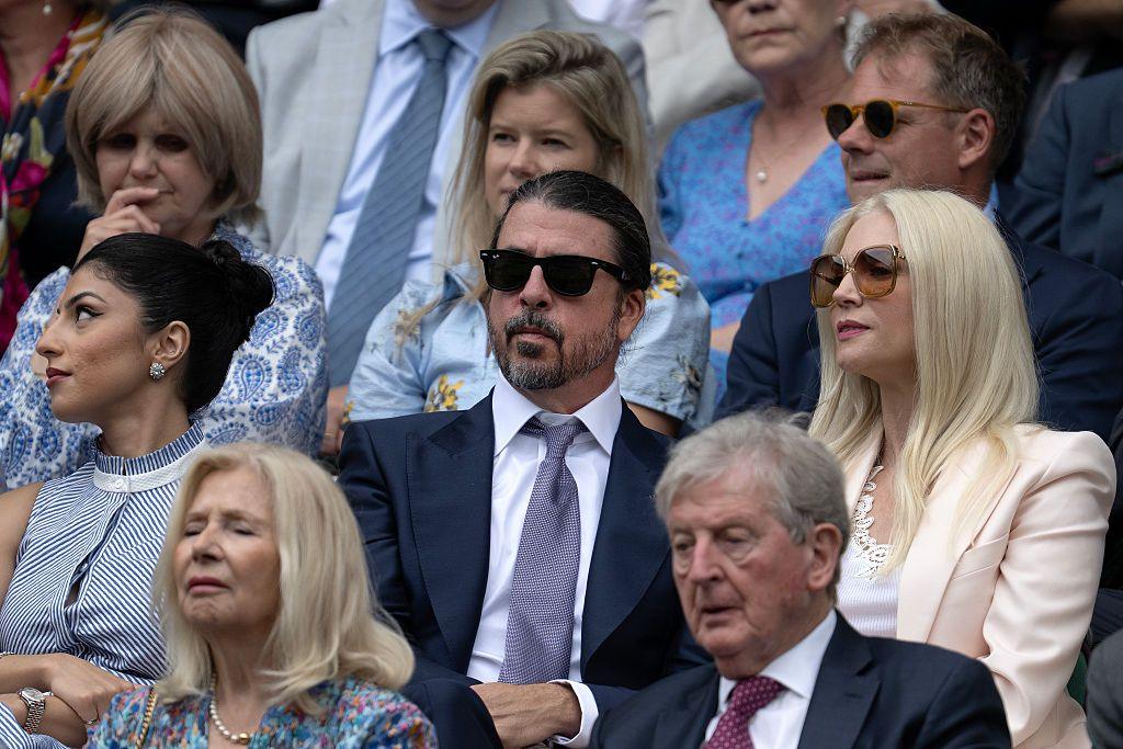 Dave Grohl and Roy Hodgson watch on from the Wimbledon Centre Court royal box