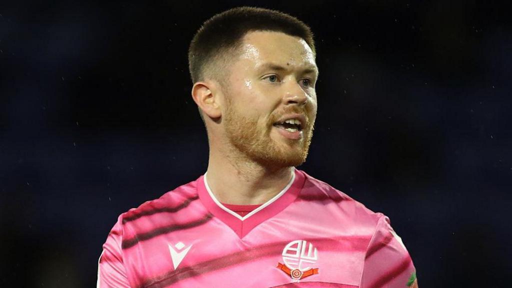 Will Forrester pictured in action for Bolton