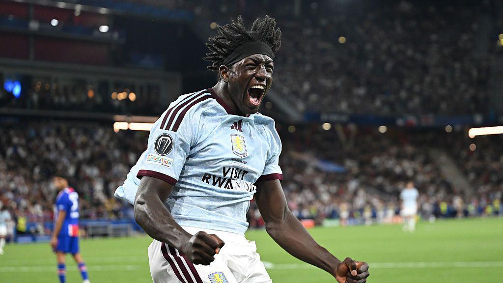 Brian Madjo celebrates scoring for Aston Villa