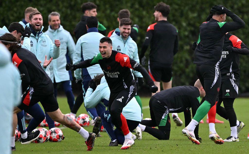Arsenal players smiling in training