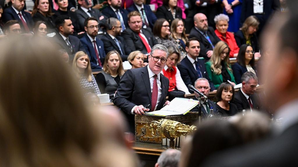 Keir Starmer looks towards the camera as he speaks at PMQs in the House of Commons