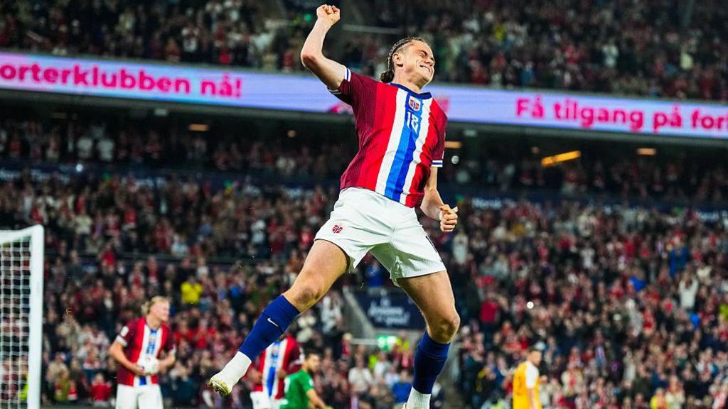 Thelo Aasgard celebrates after scoring for Norway against Moldova