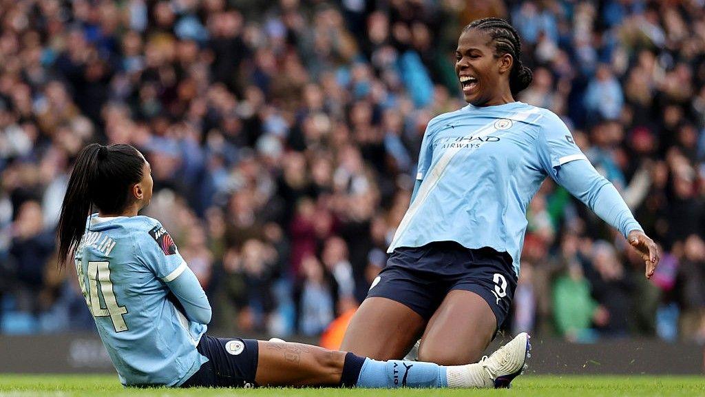 Kerolin and Khadija Shaw celebrate for Manchester City