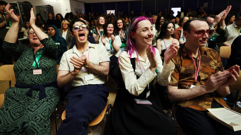 Green Party supporters celebrating at the count in Lewisham