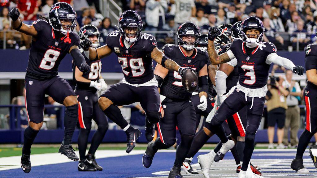 Joe Mixon celebrates scoring a touchdown in the Houston Texans' victory against the Dallas Cowboys