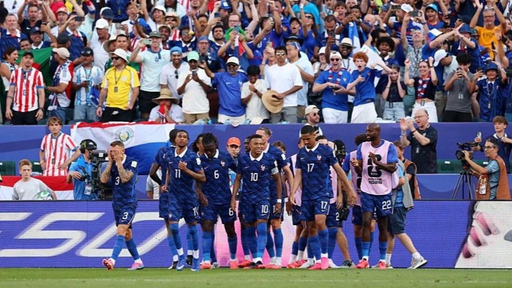 France players celebrate Kylian Mbappe's goal vs Paraguay