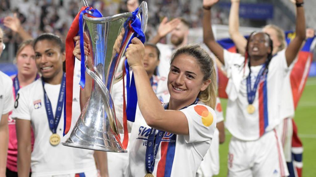 Danielle van de Donk of Olympique Lyonnais women with the UEFA women champions league trophy