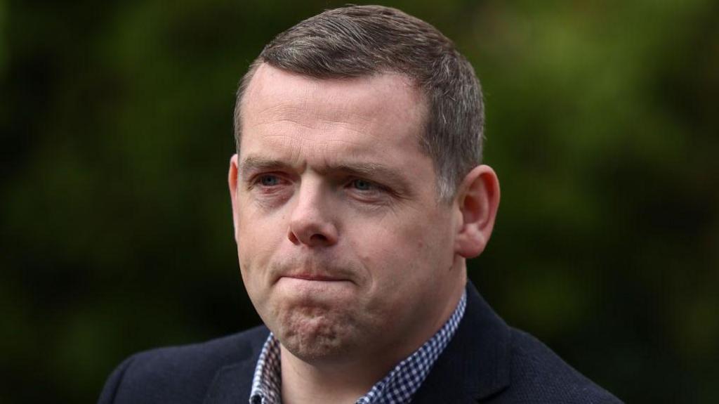 Douglas Ross pursing his lips