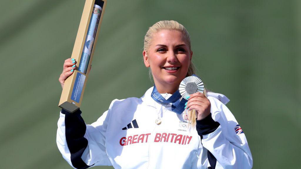 Amber Rutter with shooting silver