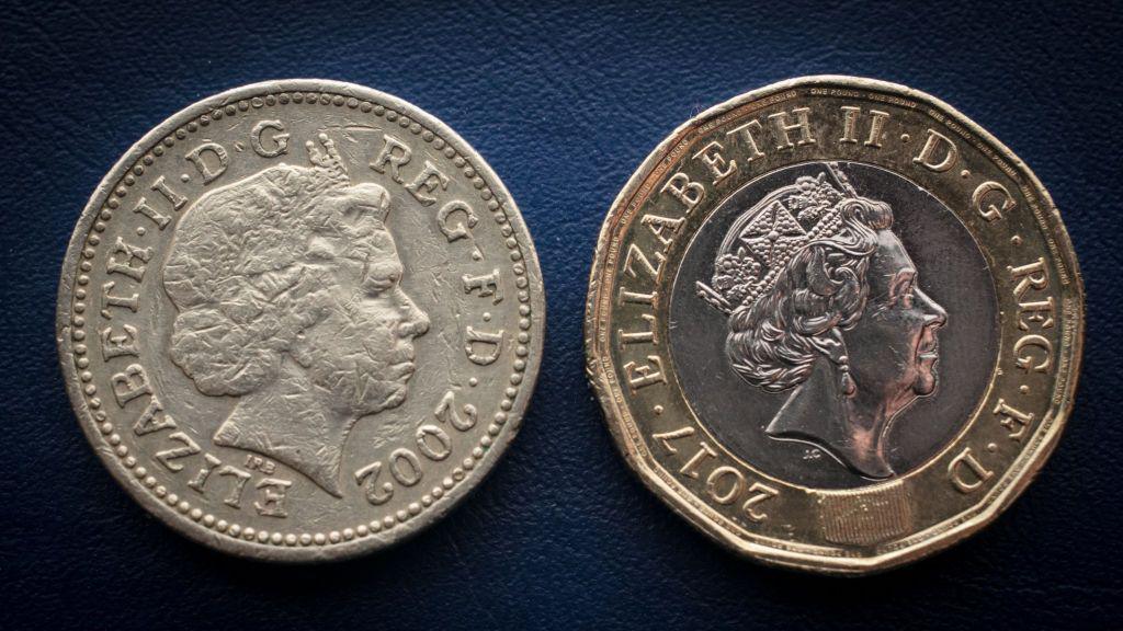 A circular pound coin on the left, with a 12-sided pound coin on the right.