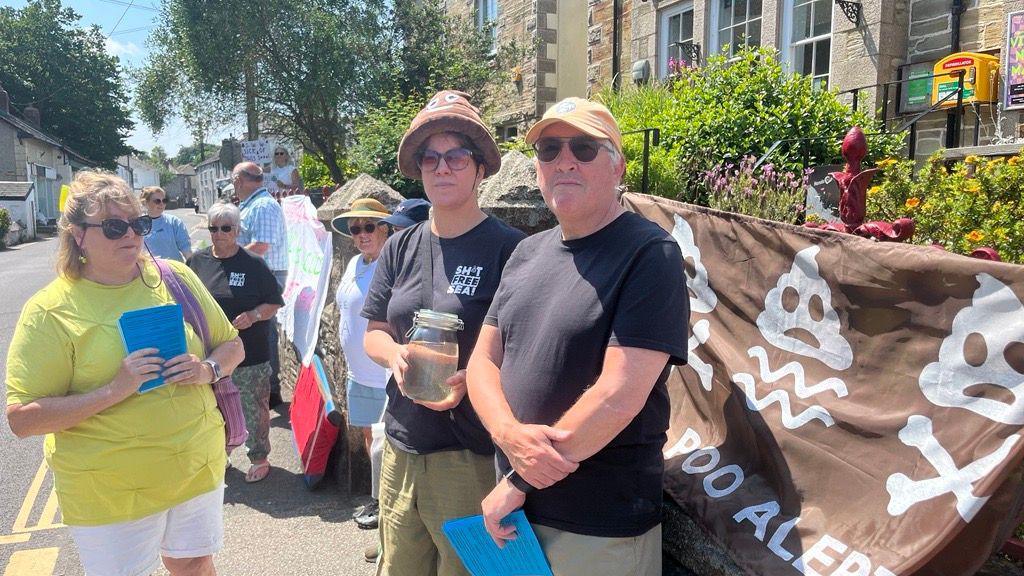 Protestors outside a SWW community engagement event in St Agnes.