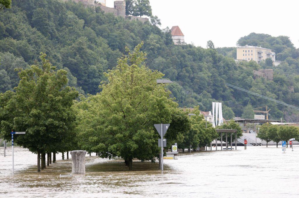 A partial view shows treets in a flooded street in the center of Passau in Bavaria, southern Germany, on June 4, 2024