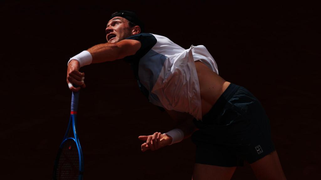 Draper Progresses in Madrid as Play Resumes