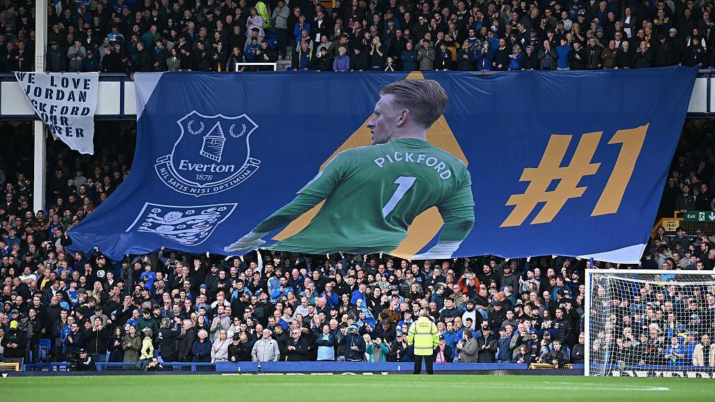 Everton fans unveil a giant banner of Pickford before their draw with Newcastle last season