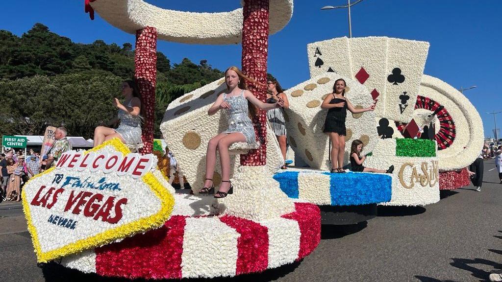 A float themed around Las Vegas, it includes giant dice, playing cards and a blackjack wheel