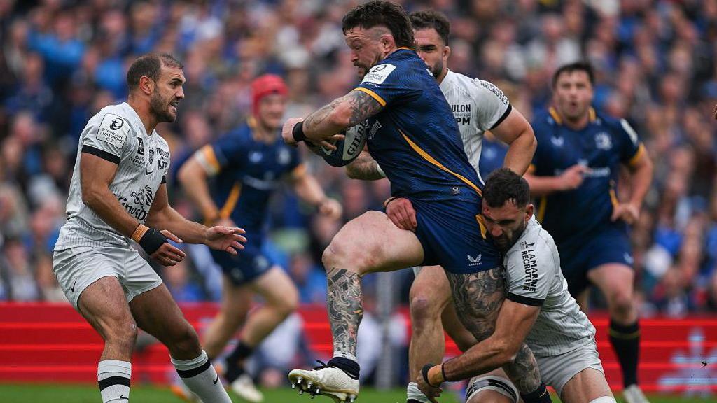 Andrew Porter runs at Toulon defenders in their Champions Cup semi-final