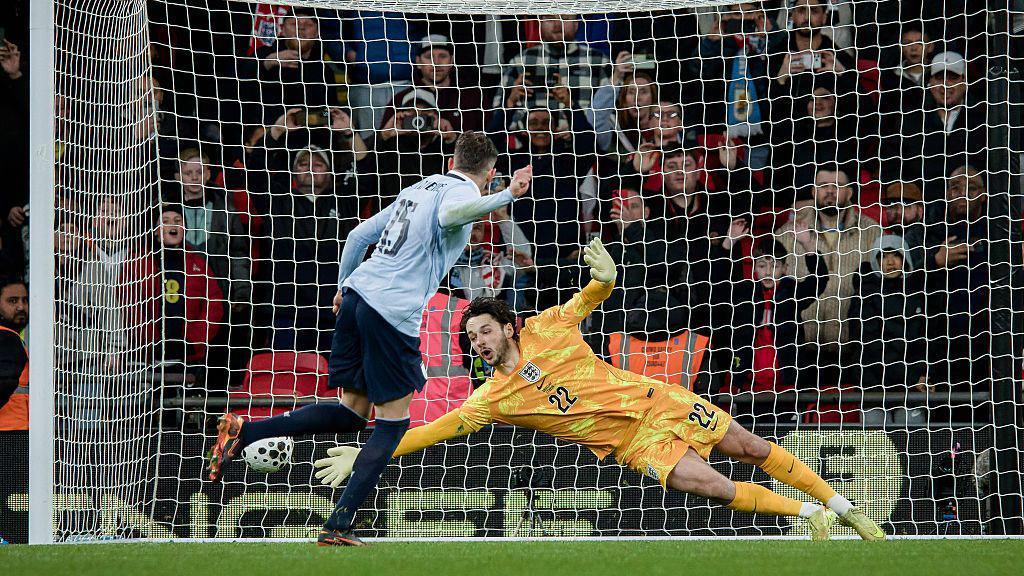 James Trafford tries to save Federico Valverde's penalty